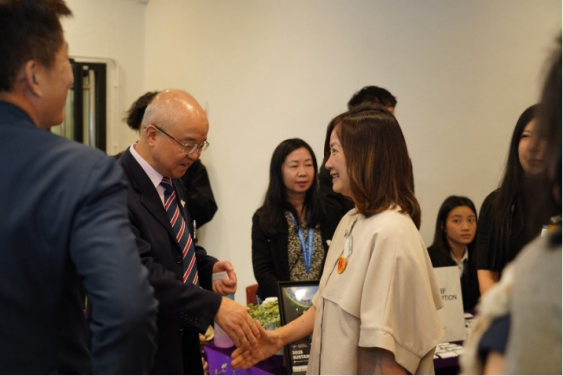 Professor Yang WANG, Vice-President and Pro-Vice-Chancellor (Institutional Advancement), Chair Professor in Mathematics, Computing and Data Science, greeting Ms. Irene LEUNG, Head of Charities (Strategy, Planning, Operations & Reporting) of The Hong Kong Jockey Club.